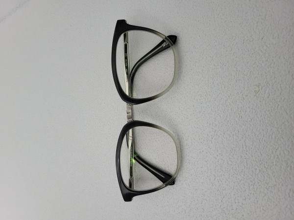 Lunettes KARL LAGERFELD KL6003 Noir Transparent Argent — Monture Ovale Design