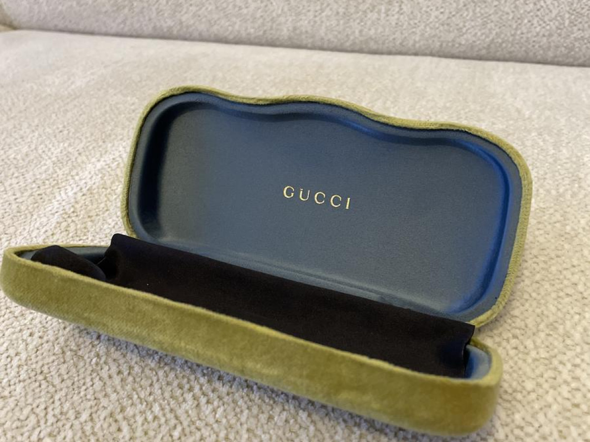 Gucci -