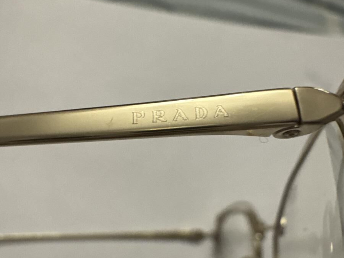 PRADA - PR62UV 51/17