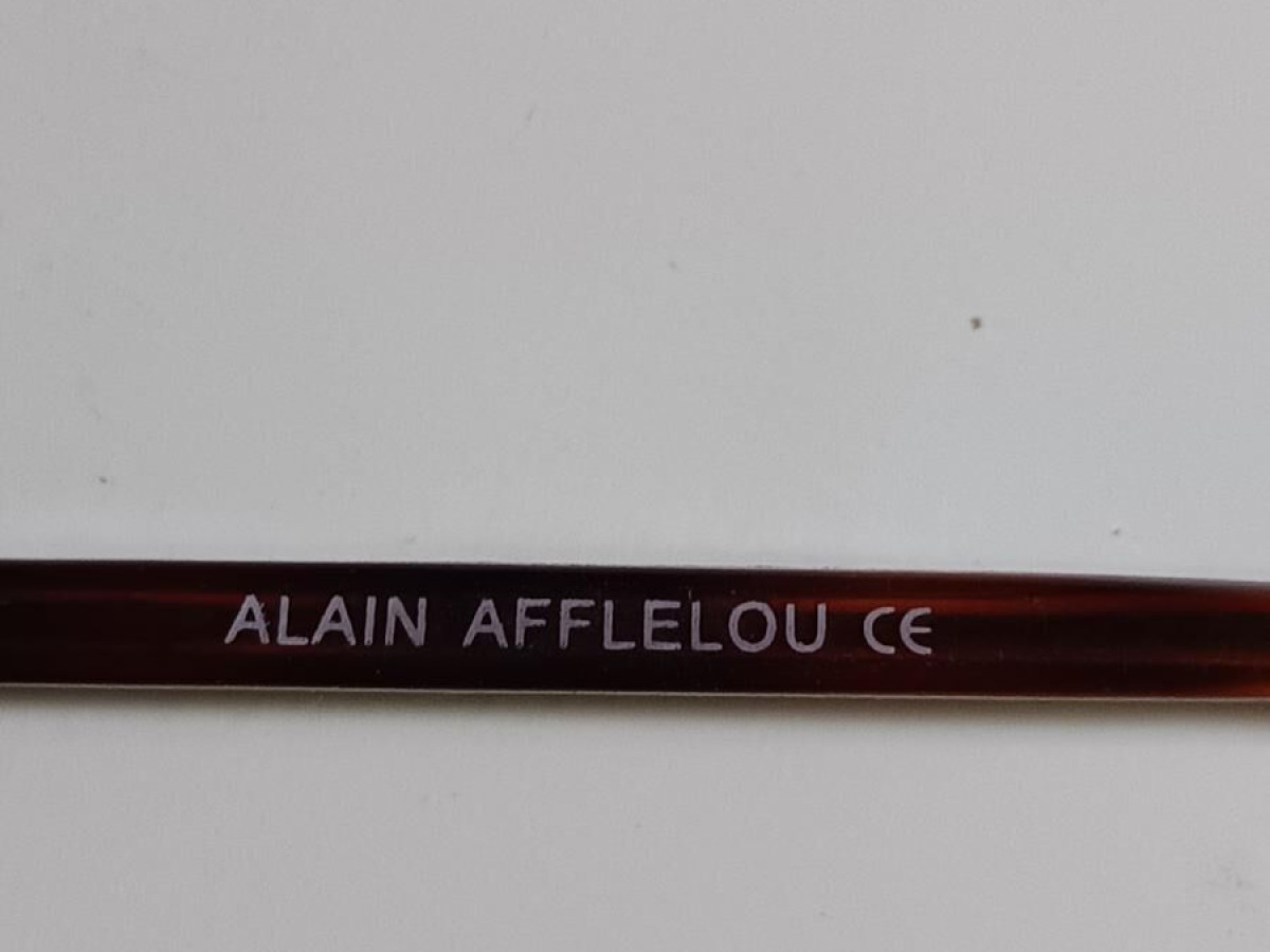 Alain Afflelou - 002 56 18/24 303 56¤18